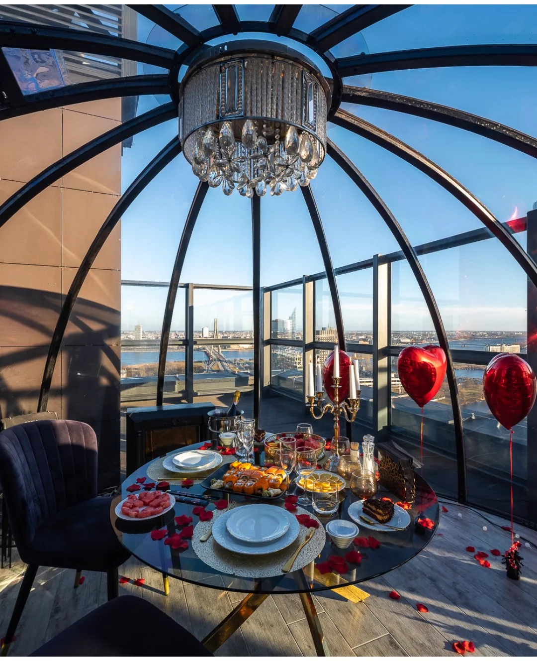 Table set for two inside the transparent igloo dome